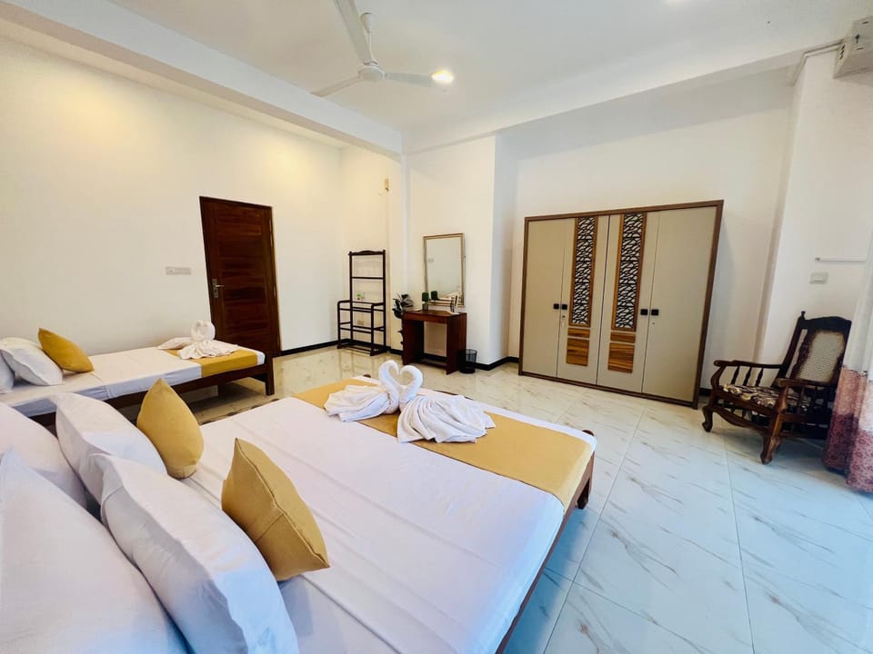 Bed, Seating area, Bedroom, towels, wardrobe, air conditioner