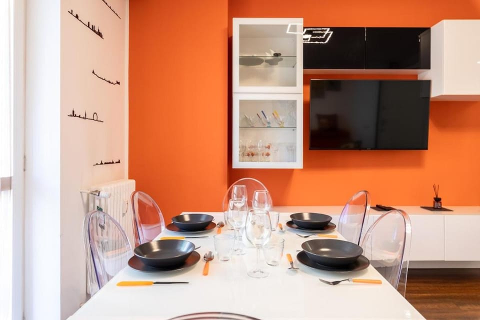 Homevo Orange Design Home M5 Bicocca Apartment in Milan