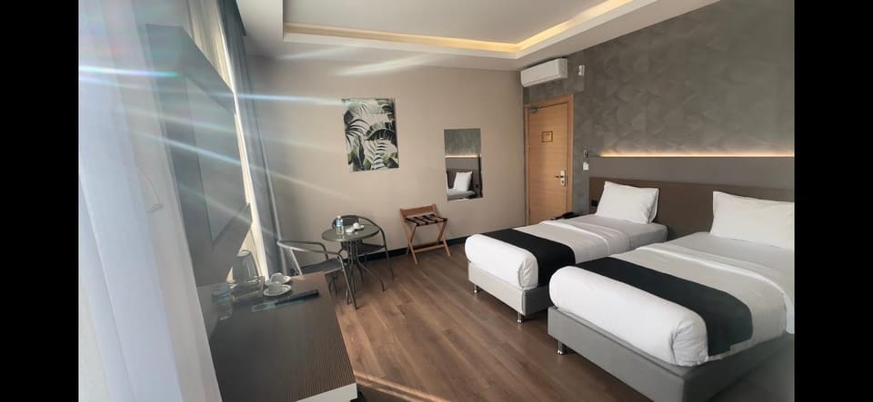 Bed, TV and multimedia, Seating area, Bedroom, air conditioner