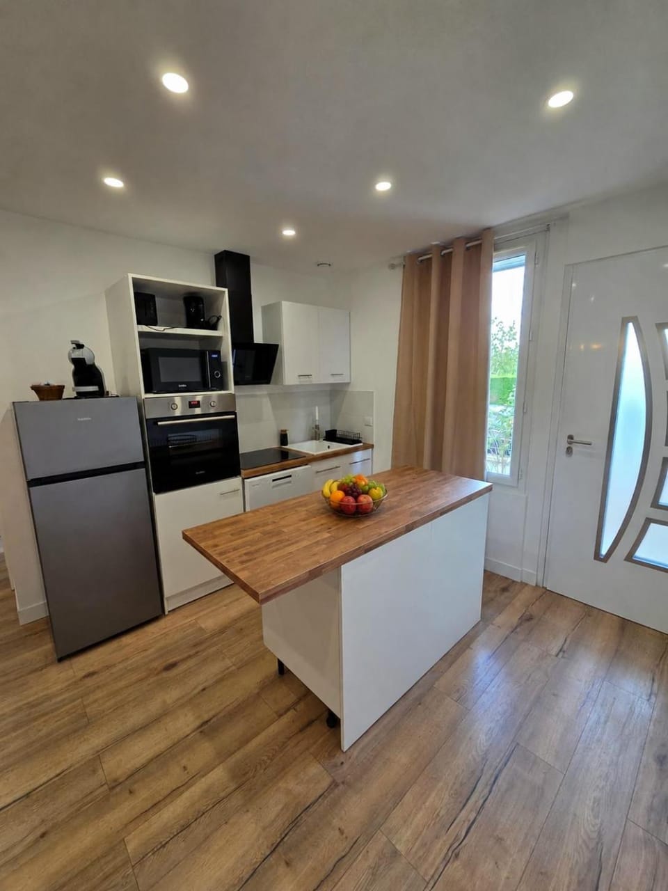 Kitchen or kitchenette, dishwasher, oven, stove, toaster