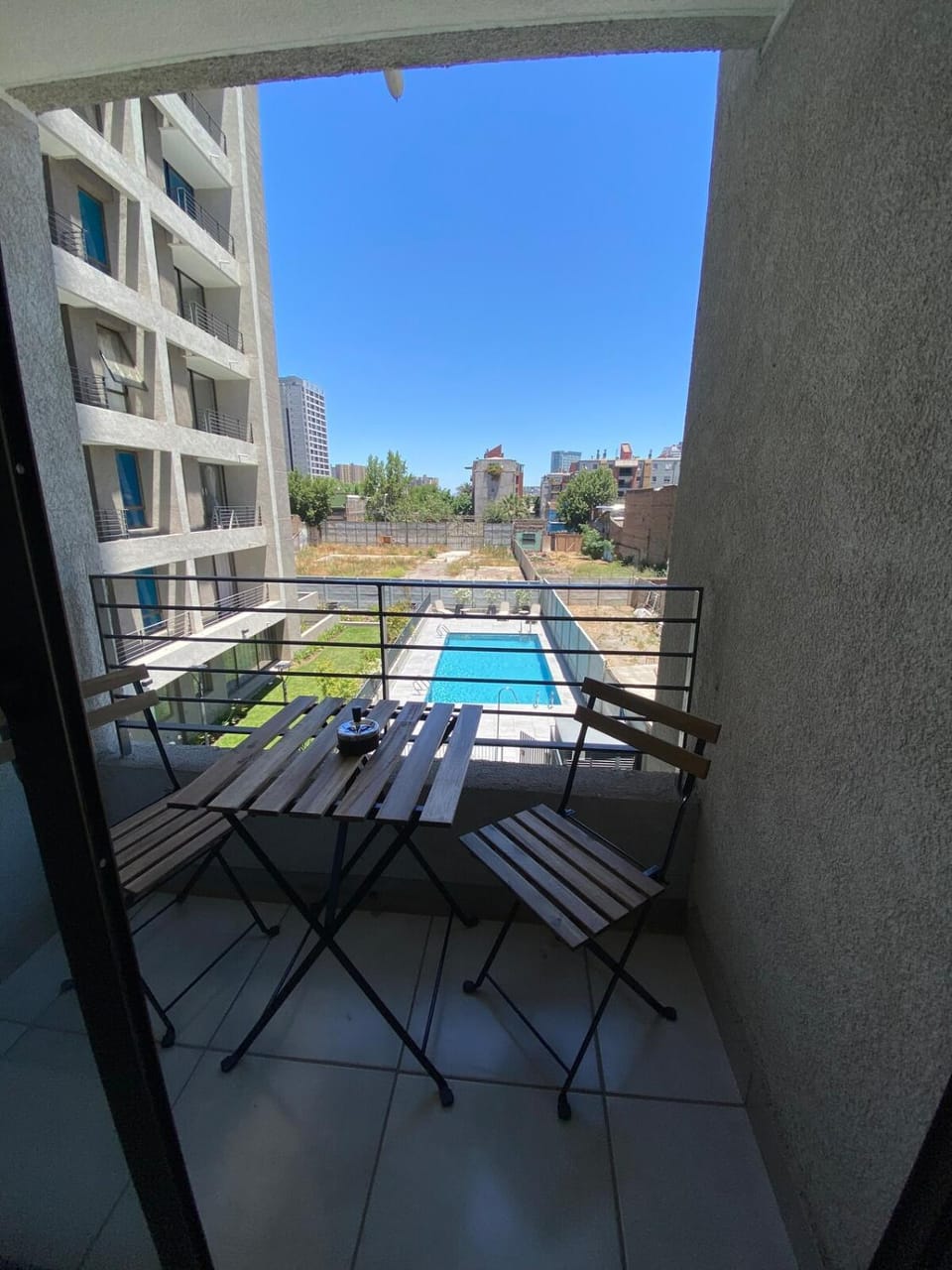 Departamento 2 personas con Piscina, GYM, Quincho y previa disponibilidad de Estacionamiento Apartment in Santiago