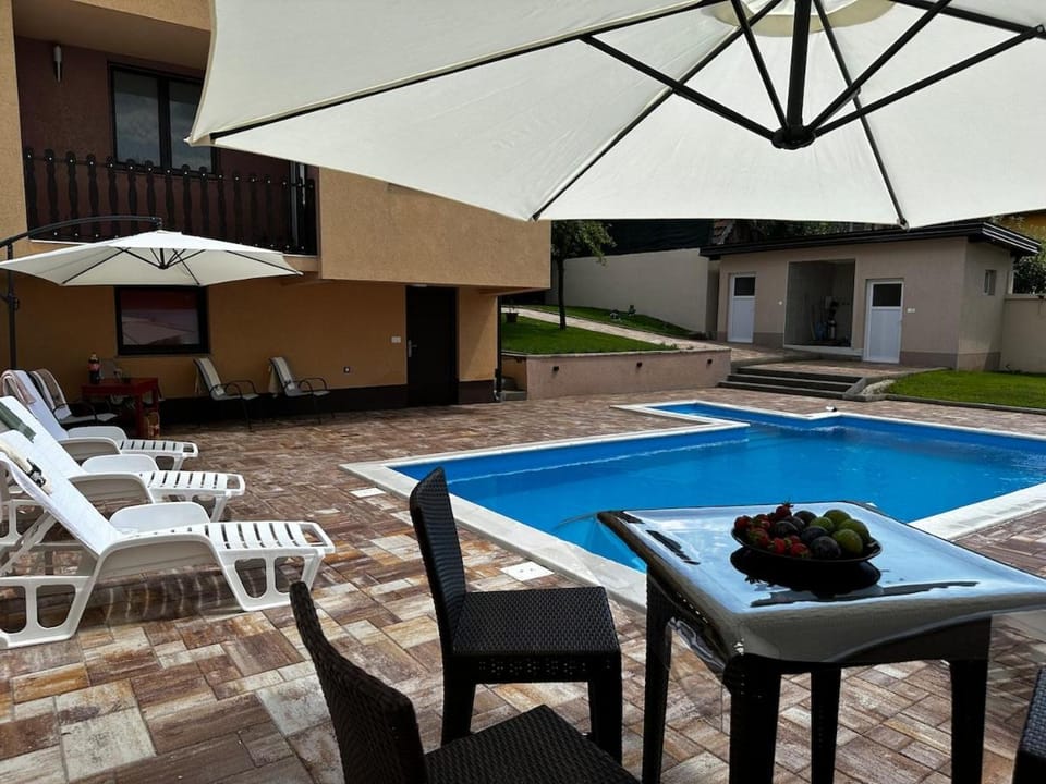 Patio, Day, Pool view, Swimming pool, sunbed
