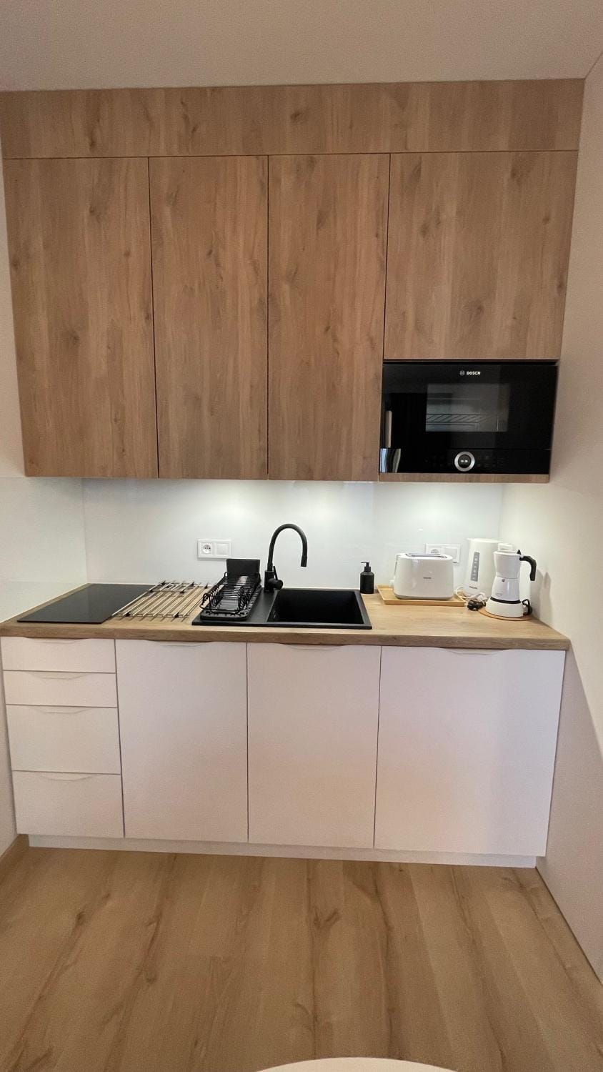 Kitchen or kitchenette, stove, toaster