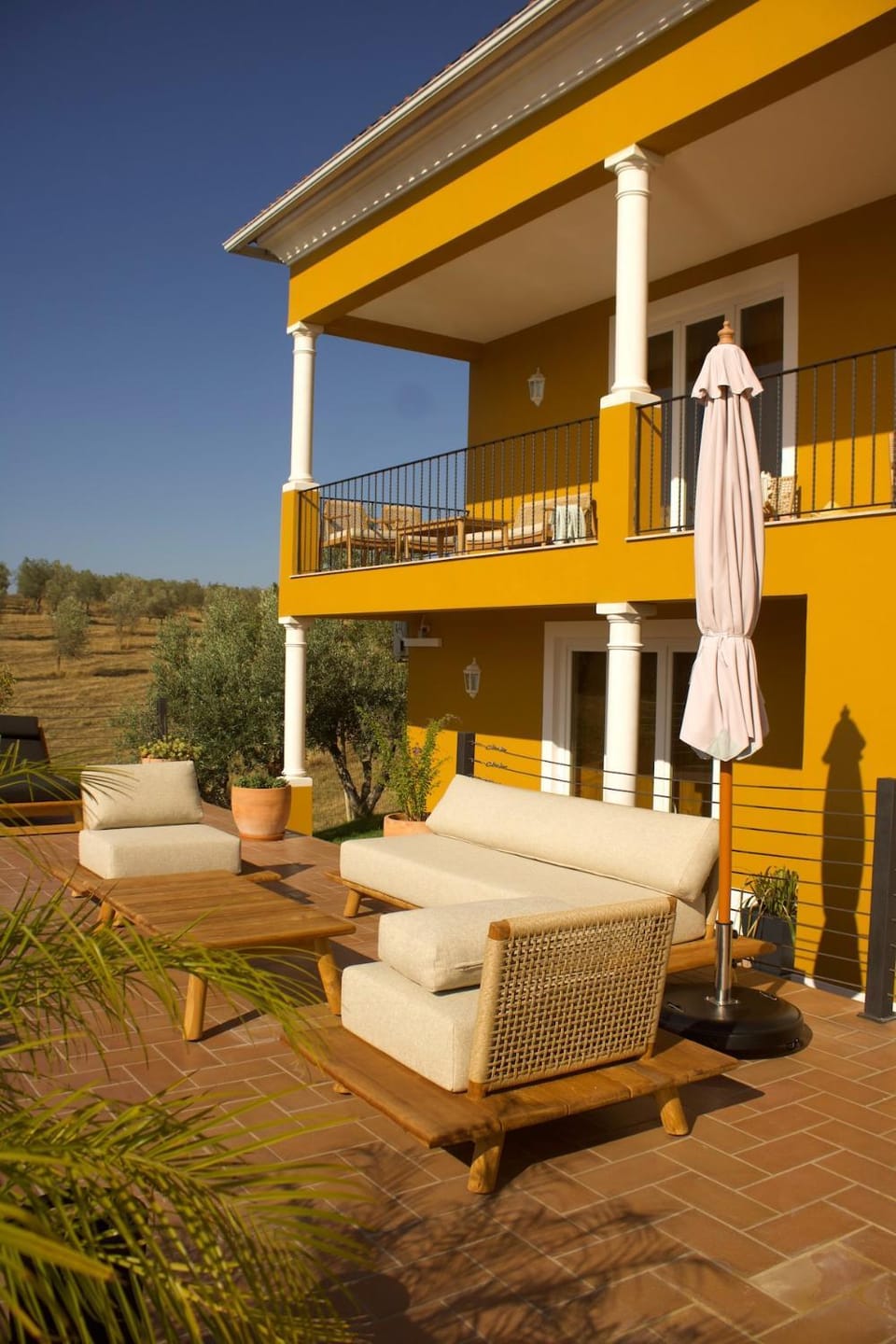 Property building, Patio, Spring, Day, View (from property/room), Balcony/Terrace, Living room, Seating area, Dining area, sunbed