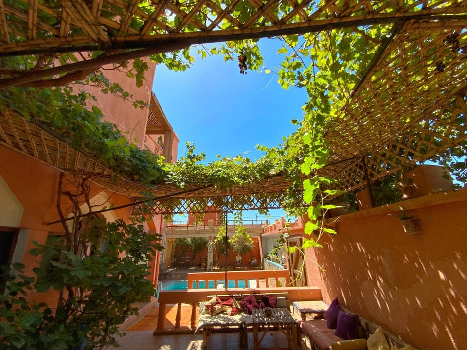 Property building, Patio, Spring, Day, Garden, View (from property/room), Balcony/Terrace, Dining area, Garden view