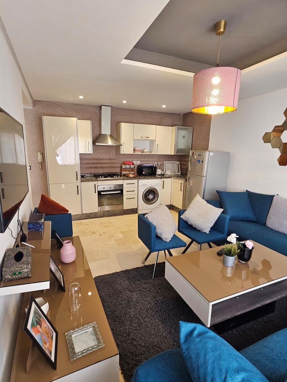 TV and multimedia, Kitchen or kitchenette, Living room, Seating area, Dining area, internet, oven, stove, toaster, washing machine, air conditioner