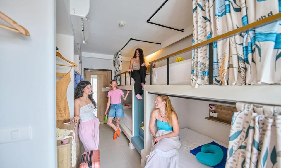 group of guests, bunk bed, wardrobe
