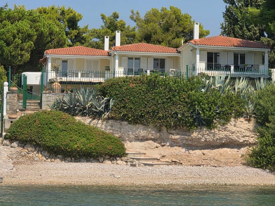 Property building, Day, Natural landscape, Beach, Sea view