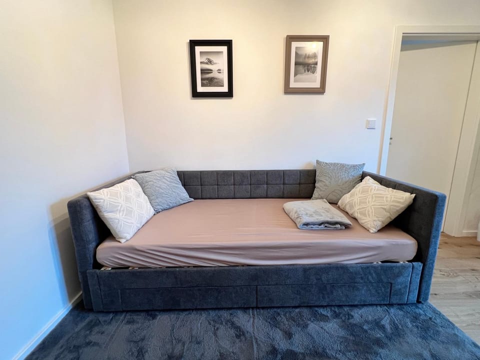Bed, Living room, Seating area