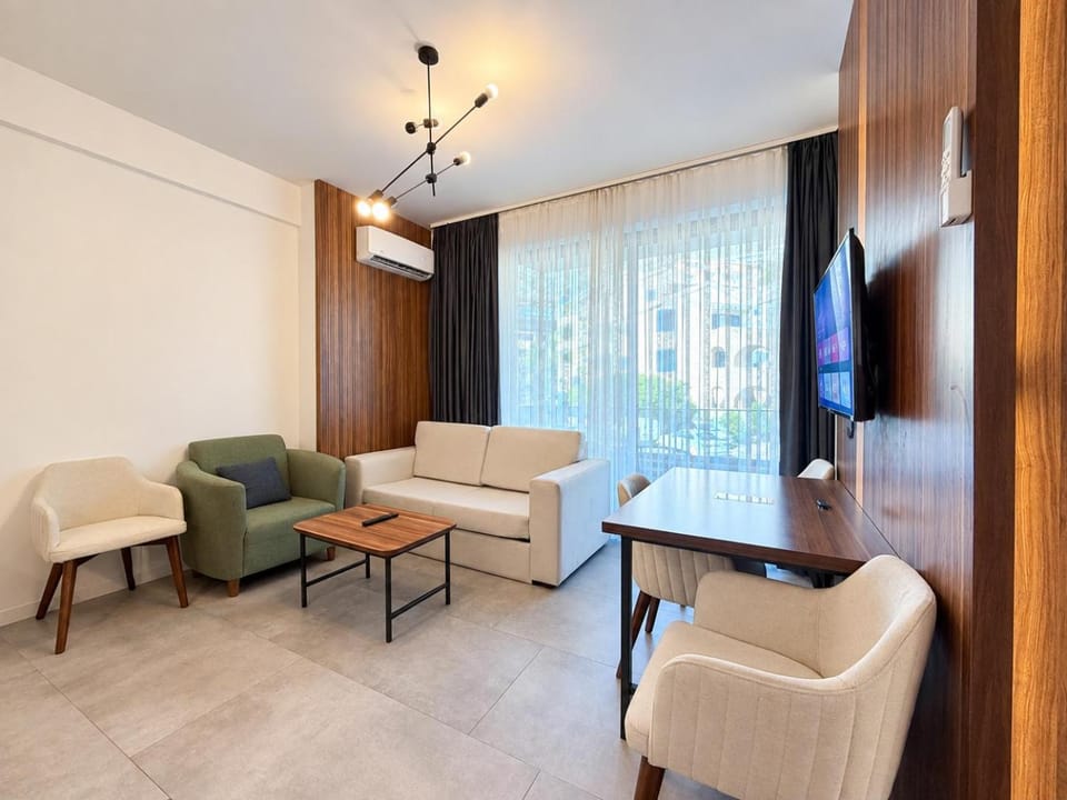 Communal lounge/ TV room, TV and multimedia, Living room, Seating area, Evening entertainment, air conditioner