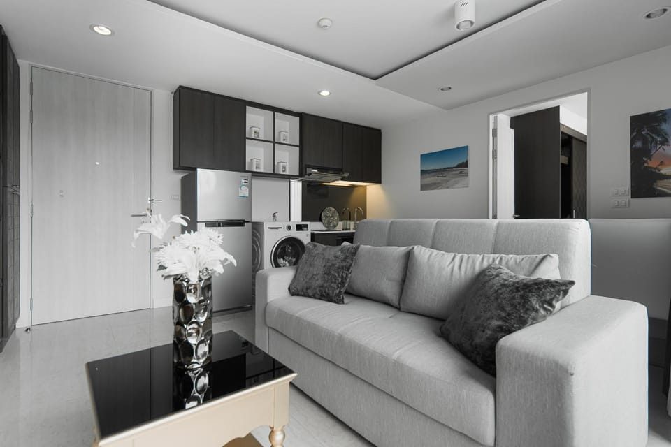 Living room, Seating area, washing machine, kitchen