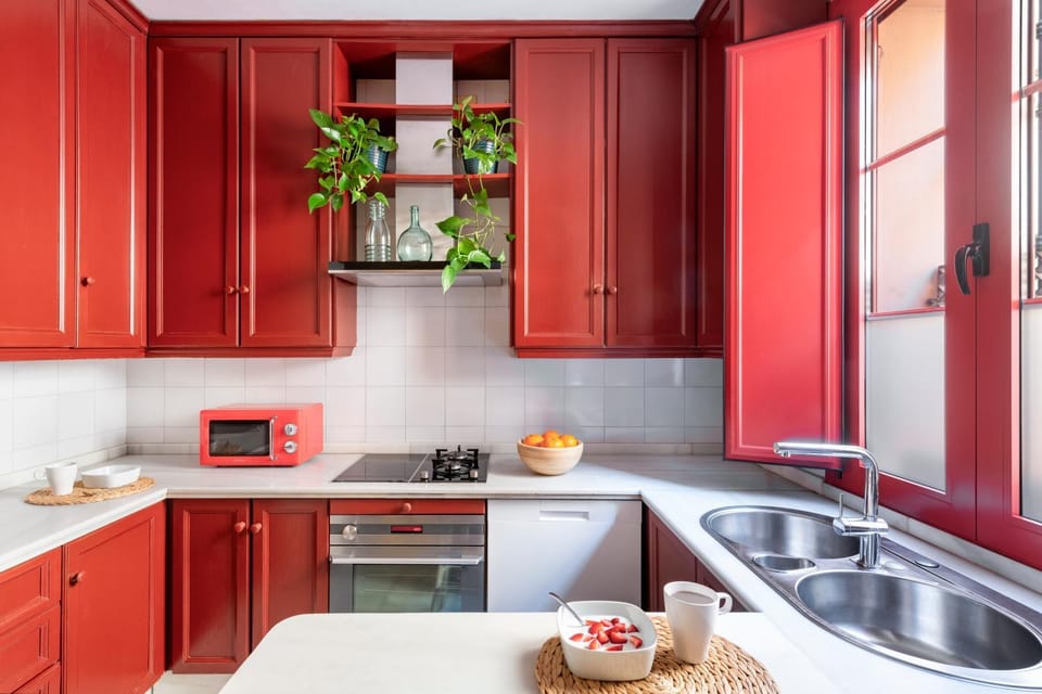Kitchen or kitchenette, dishwasher, oven, stove, toaster