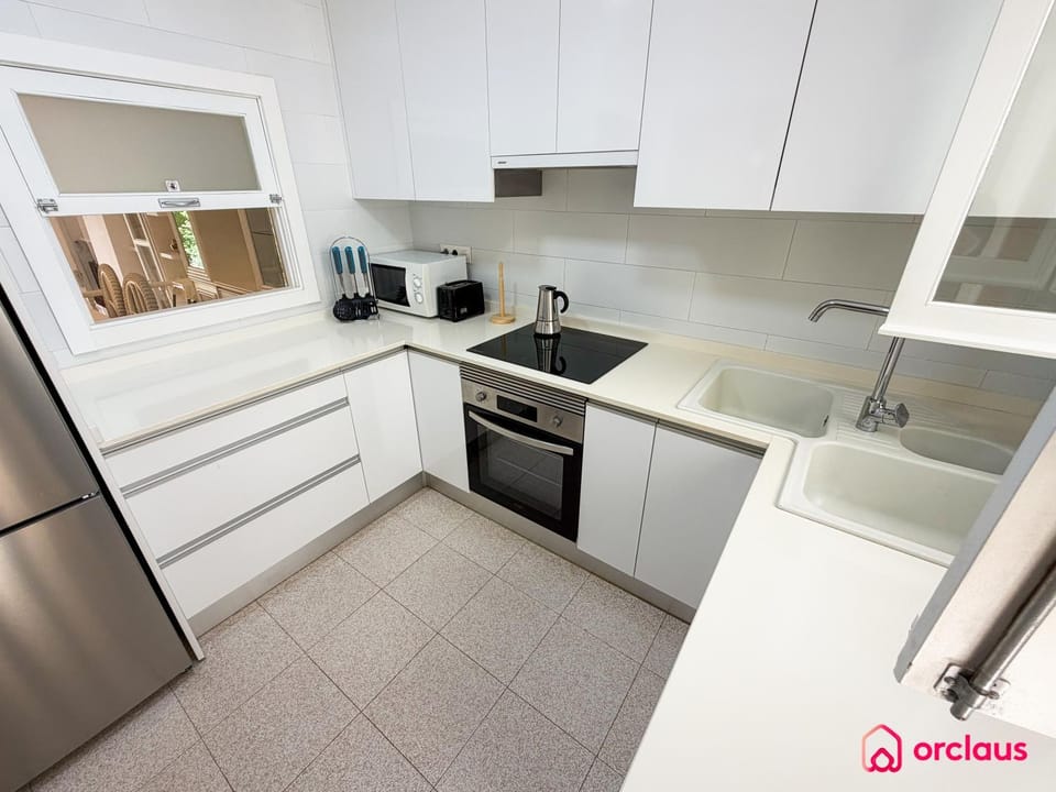 Kitchen or kitchenette, oven, stove