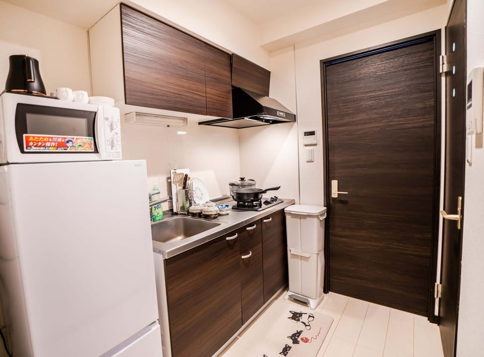 Kitchen or kitchenette, stove