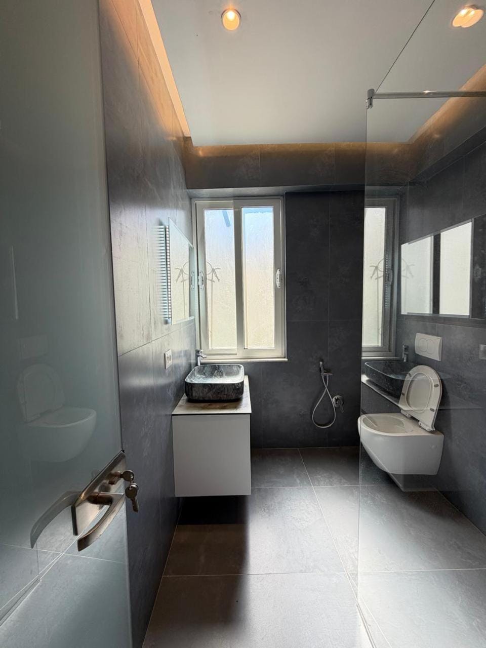 The SunSet Studio next to The Pyramid Apartment in Tirana