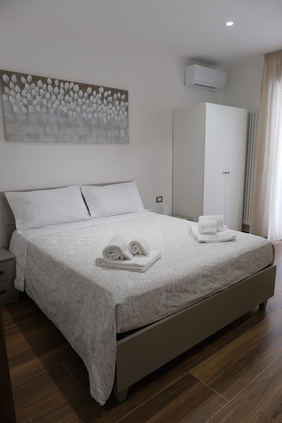 Bed, Balcony/Terrace, Bedroom, towels, wardrobe, air conditioner