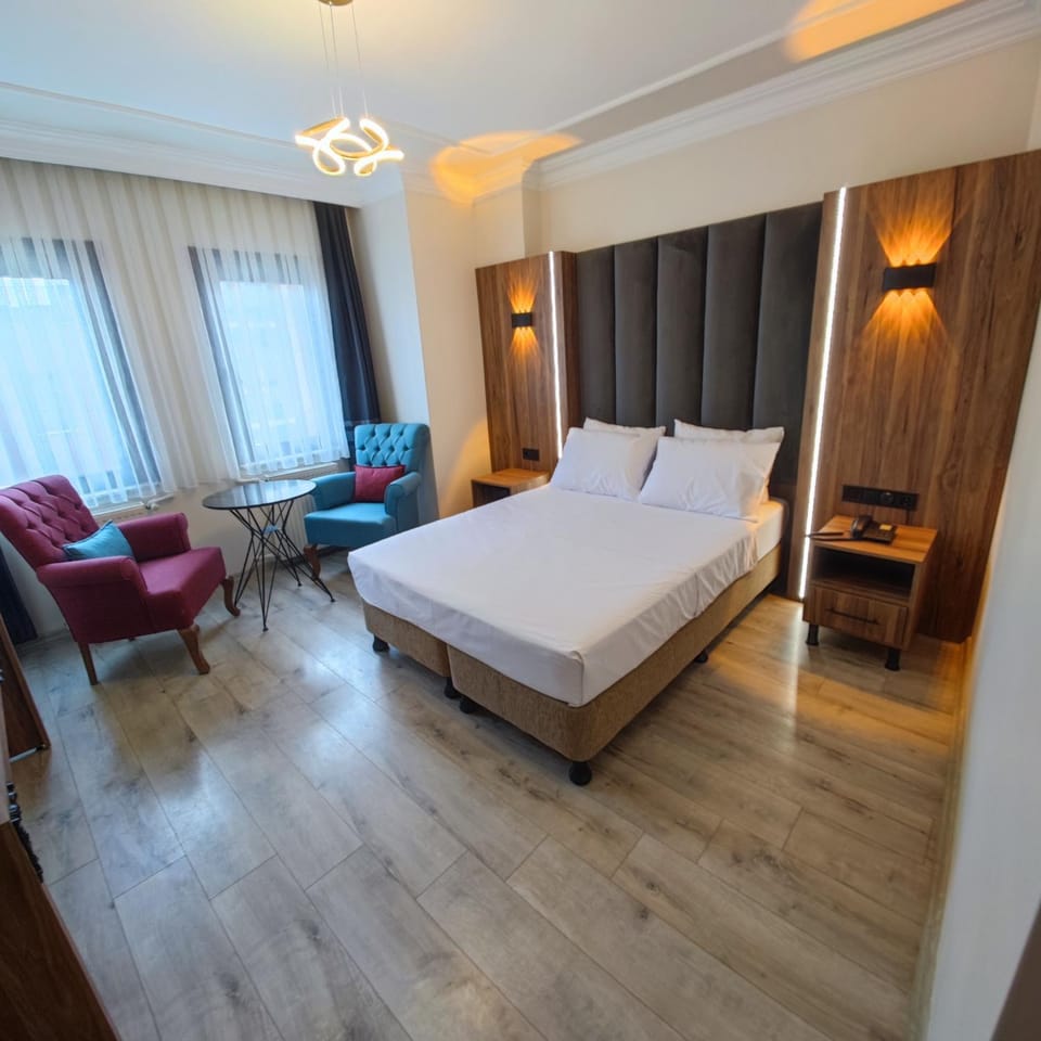 Bed, Seating area, Bedroom