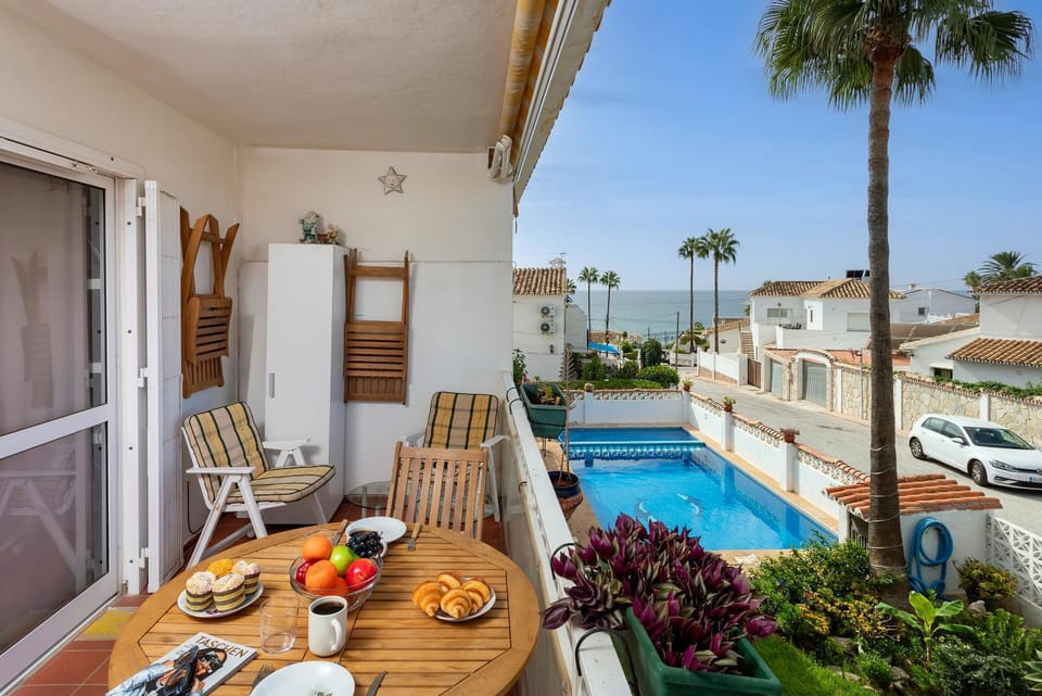 View (from property/room), Balcony/Terrace, Pool view, Sea view