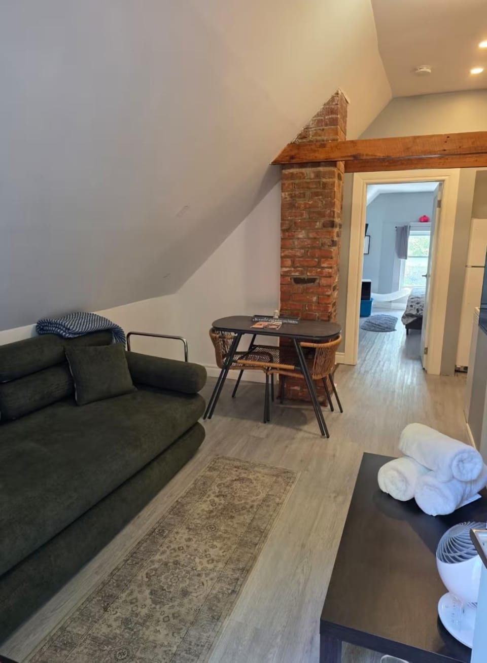 Bed, Living room, Seating area, Dining area, towels
