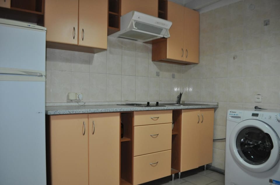Kitchen or kitchenette, washing machine