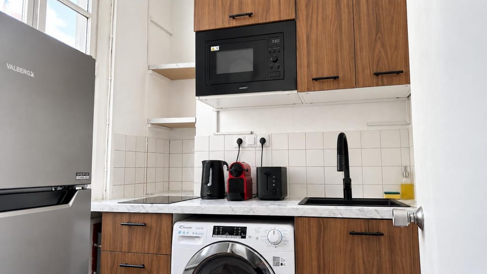 Kitchen or kitchenette, stove, toaster