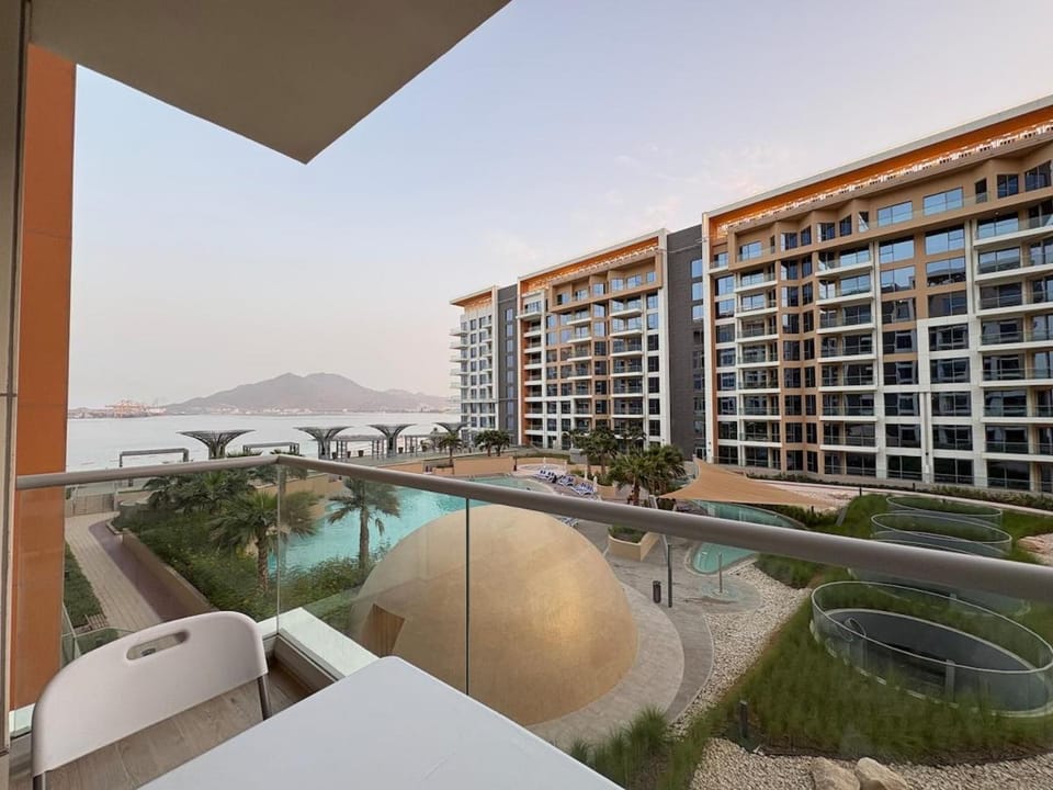 Beachfront 2BR Maids Room Khorfakkan Airmyhome Apartment in Sharjah