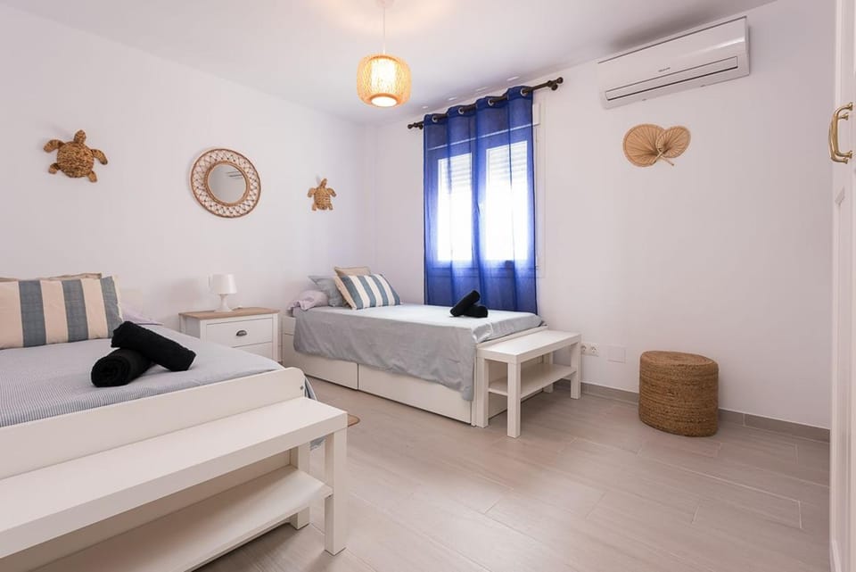 Photo of the whole room, Bedroom, towels, air conditioner