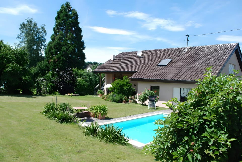 Property building, Living room, Swimming pool