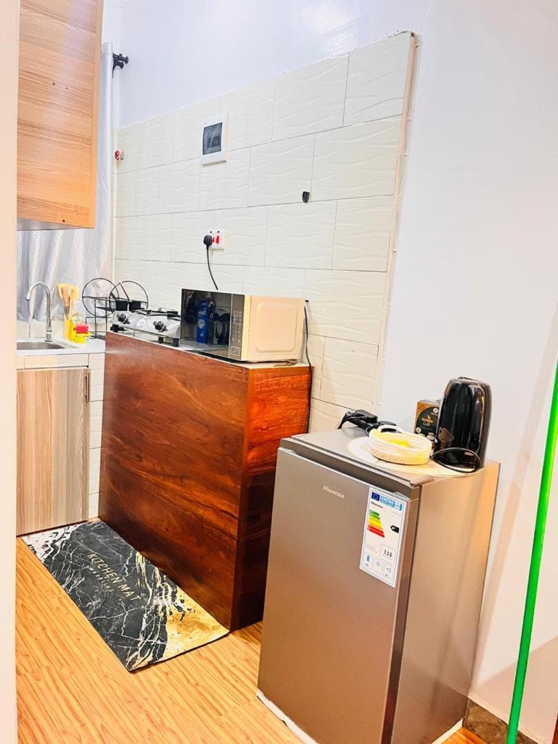 The Naalya Lux Nook Stylish 1BR near the main road Apartment in Kampala