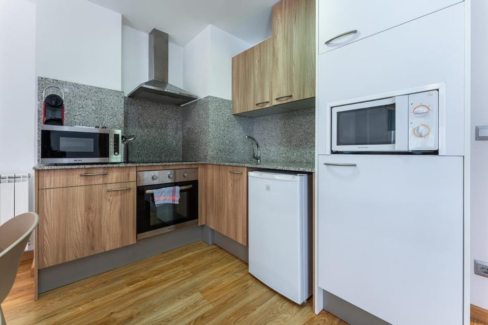 Kitchen or kitchenette, oven, stove