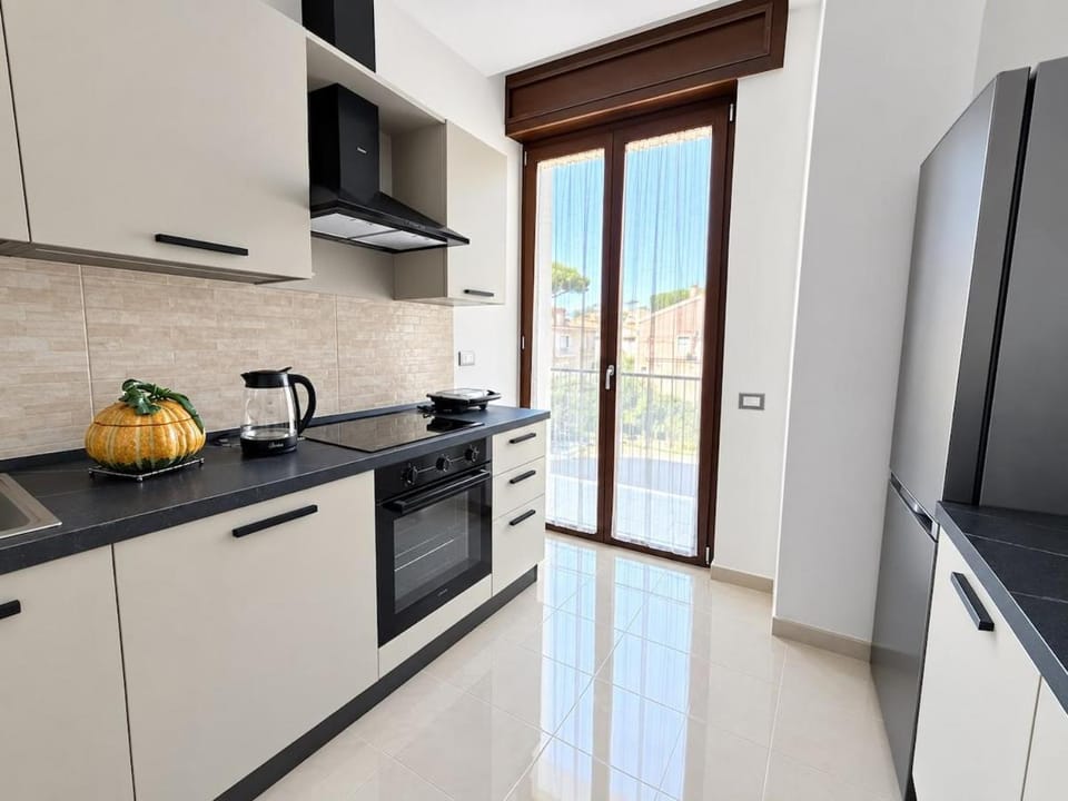 Kitchen or kitchenette, oven, stove
