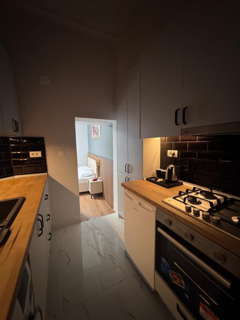 Kitchen or kitchenette, stove