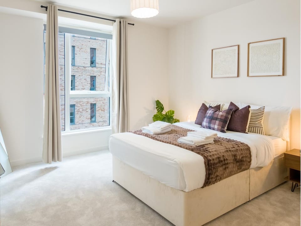 Bed, Bedroom, flat iron, hair dryier, wardrobe