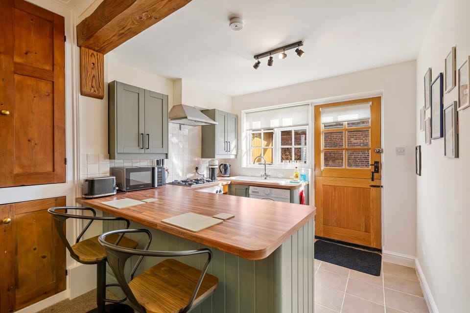Kitchen or kitchenette, oven, stove, toaster