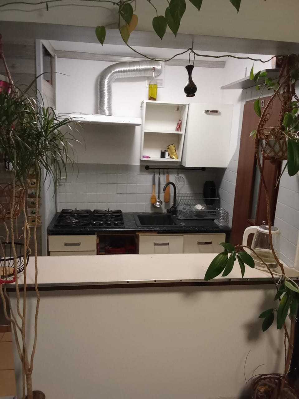 Kitchen or kitchenette, stove