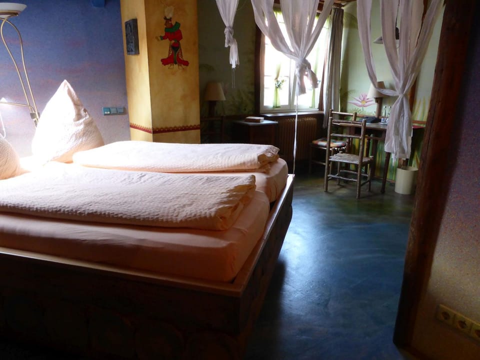 Bed, Seating area, Bedroom