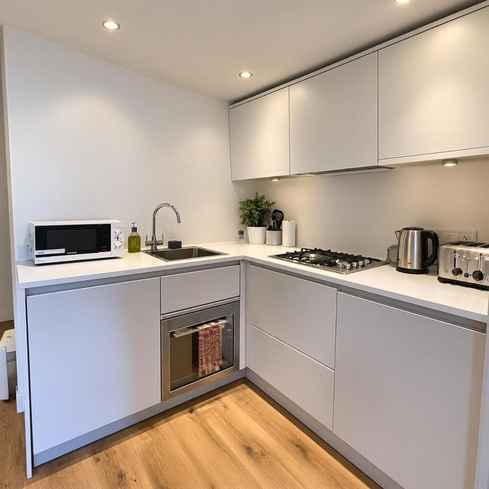 Kitchen or kitchenette, stove, toaster