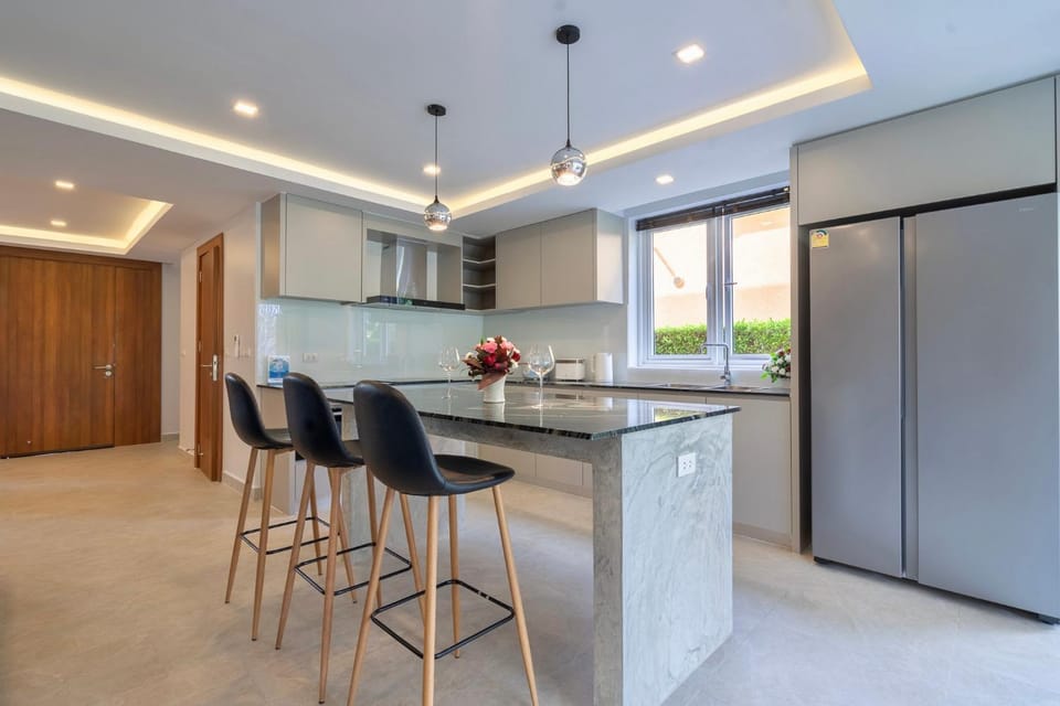 Kitchen or kitchenette, furniture, oven, stove, toaster, kitchen, air conditioner