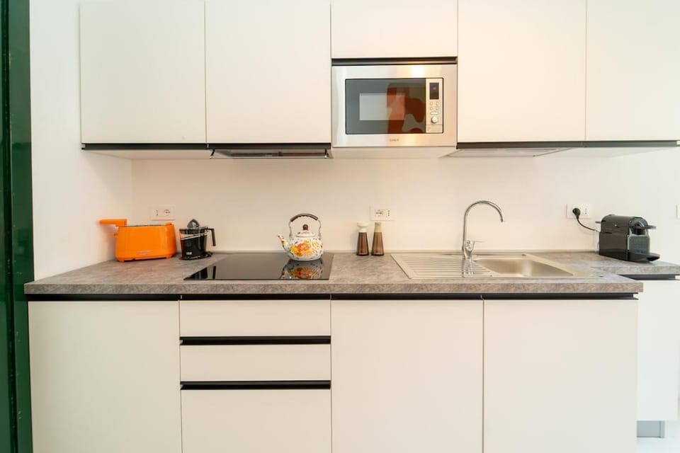 Spacious penthouse with terrace in the heart of Como Apartment in Como