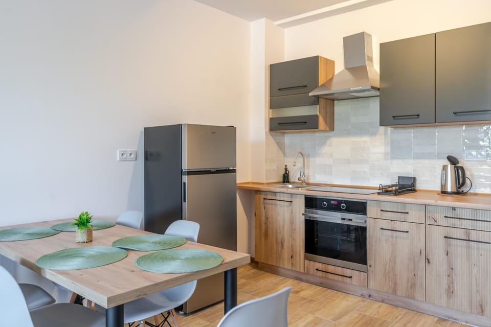 Kitchen or kitchenette, oven, stove