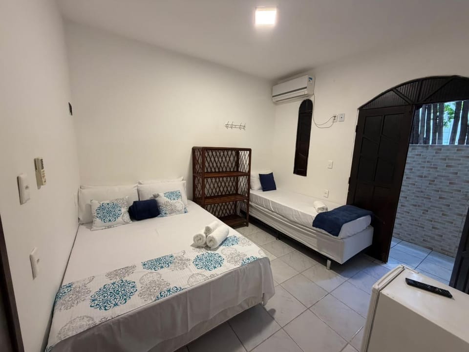 Bed, air conditioner