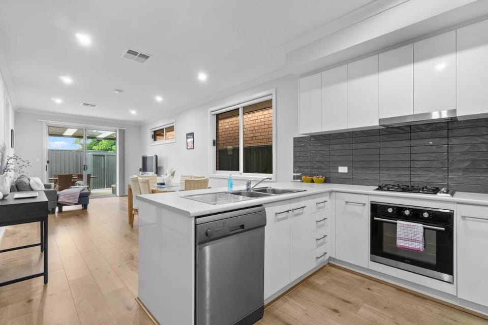 Kitchen or kitchenette, Dining area, dishwasher, oven, stove, toaster