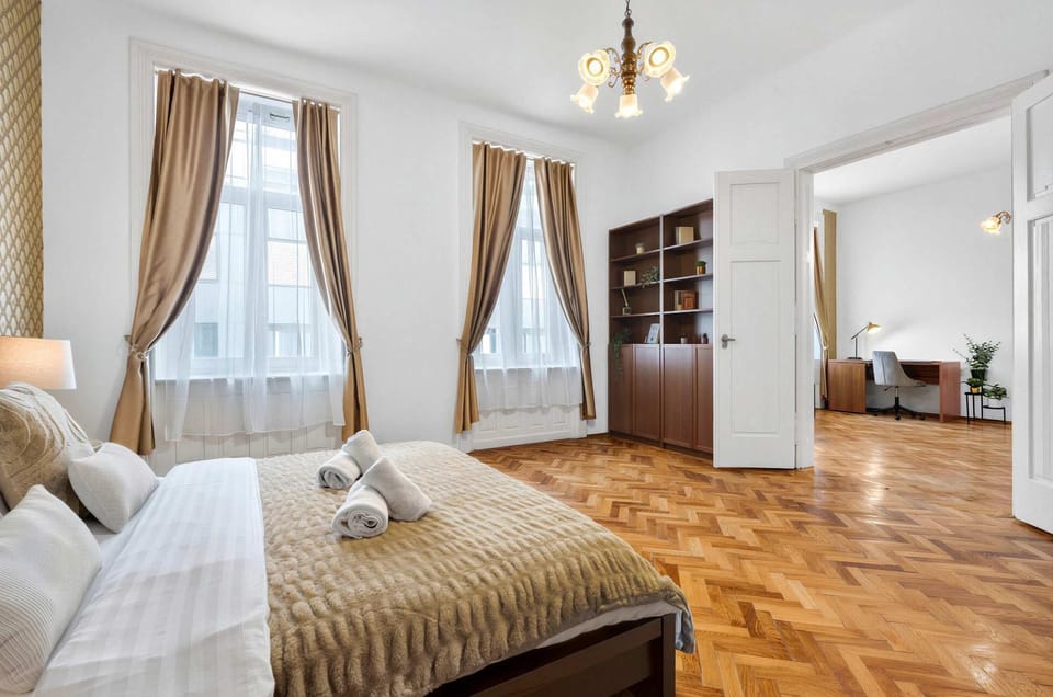 Bed, Library, Seating area, Bedroom