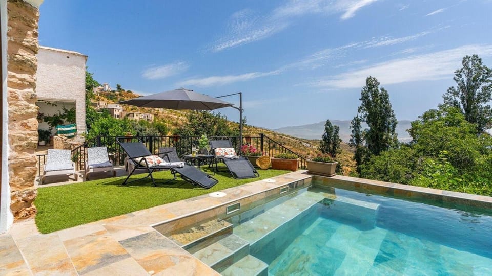 Property building, Living room, Swimming pool