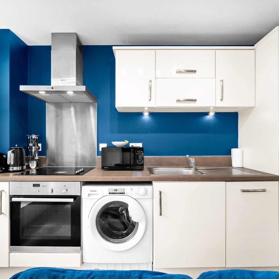 Kitchen or kitchenette, stove, toaster