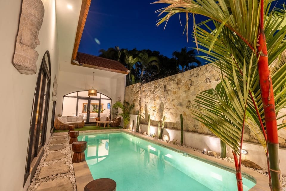 Property building, Patio, Night, Pool view, Swimming pool, sunbed