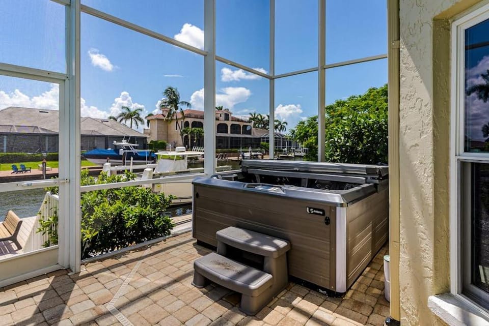 Spacious dog friendly home with private pool & hot tub dock & close to everything House in Marco Island