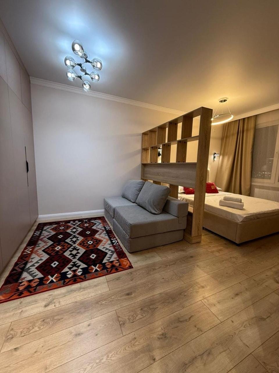 Bed, Living room, Seating area, wardrobe
