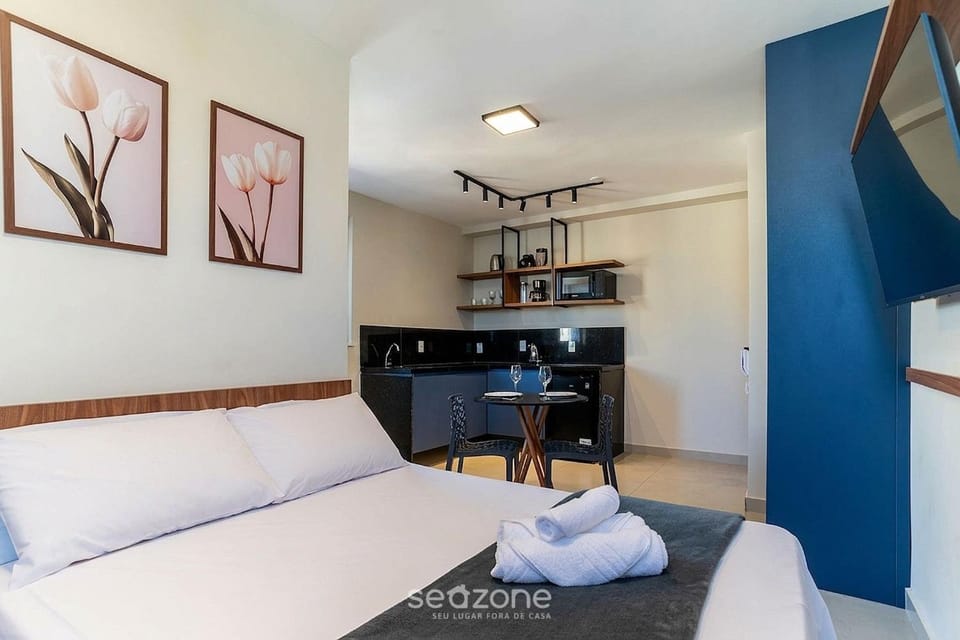 TV and multimedia, View (from property/room), Kitchen or kitchenette, Seating area, Bedroom