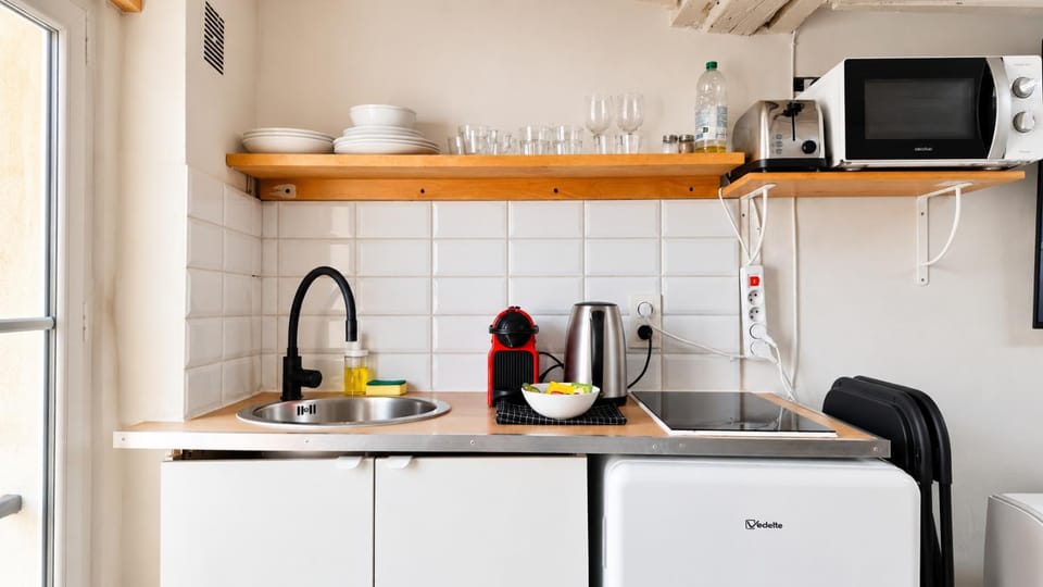 Kitchen or kitchenette, stove, toaster